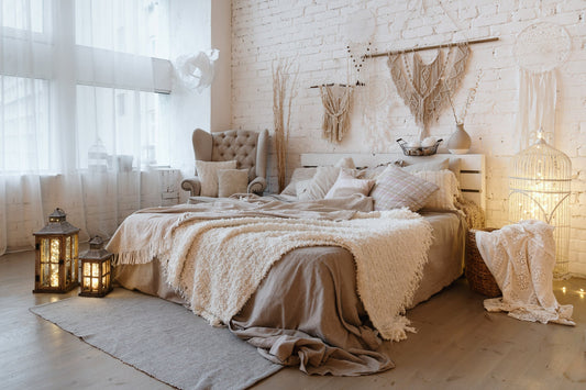 boho bedroom with candles and throws