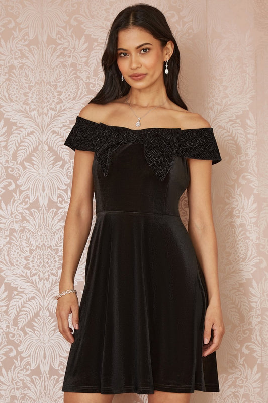 Mela Black Velvet Skater Dress With Sparkle Bow Neckline