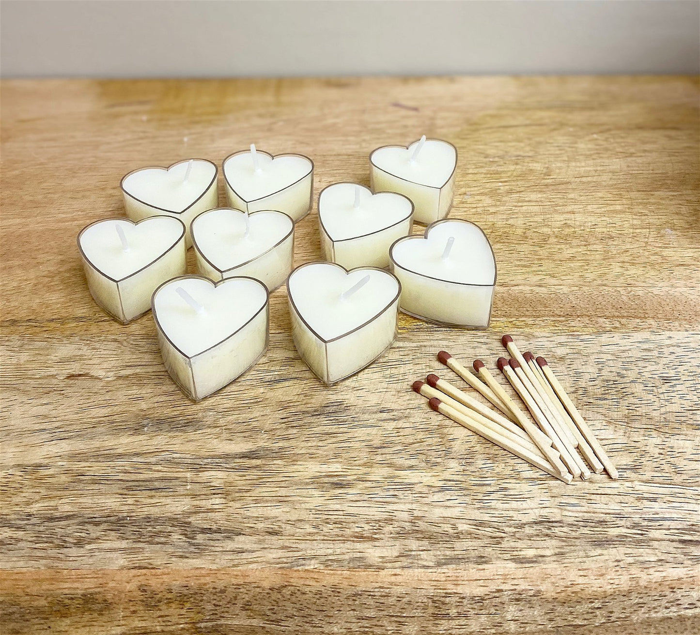 Pack of Nine Small Heart Shaped Tea Light Candles